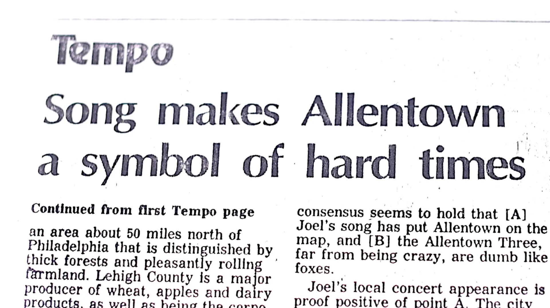 Newspaper headline reading “Song makes Allentown a symbol of hard times”