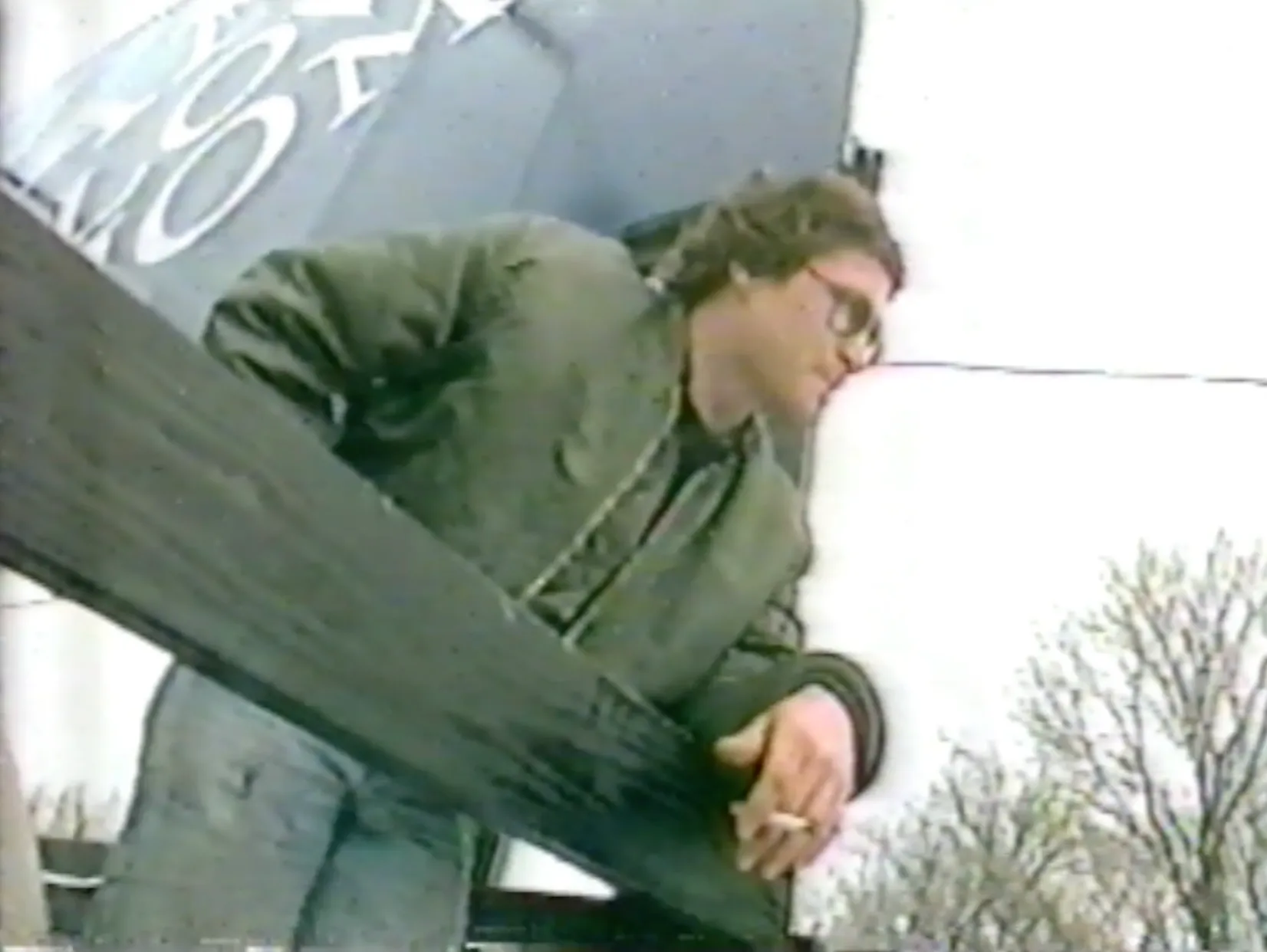 A contestant on the billboard scaffold
