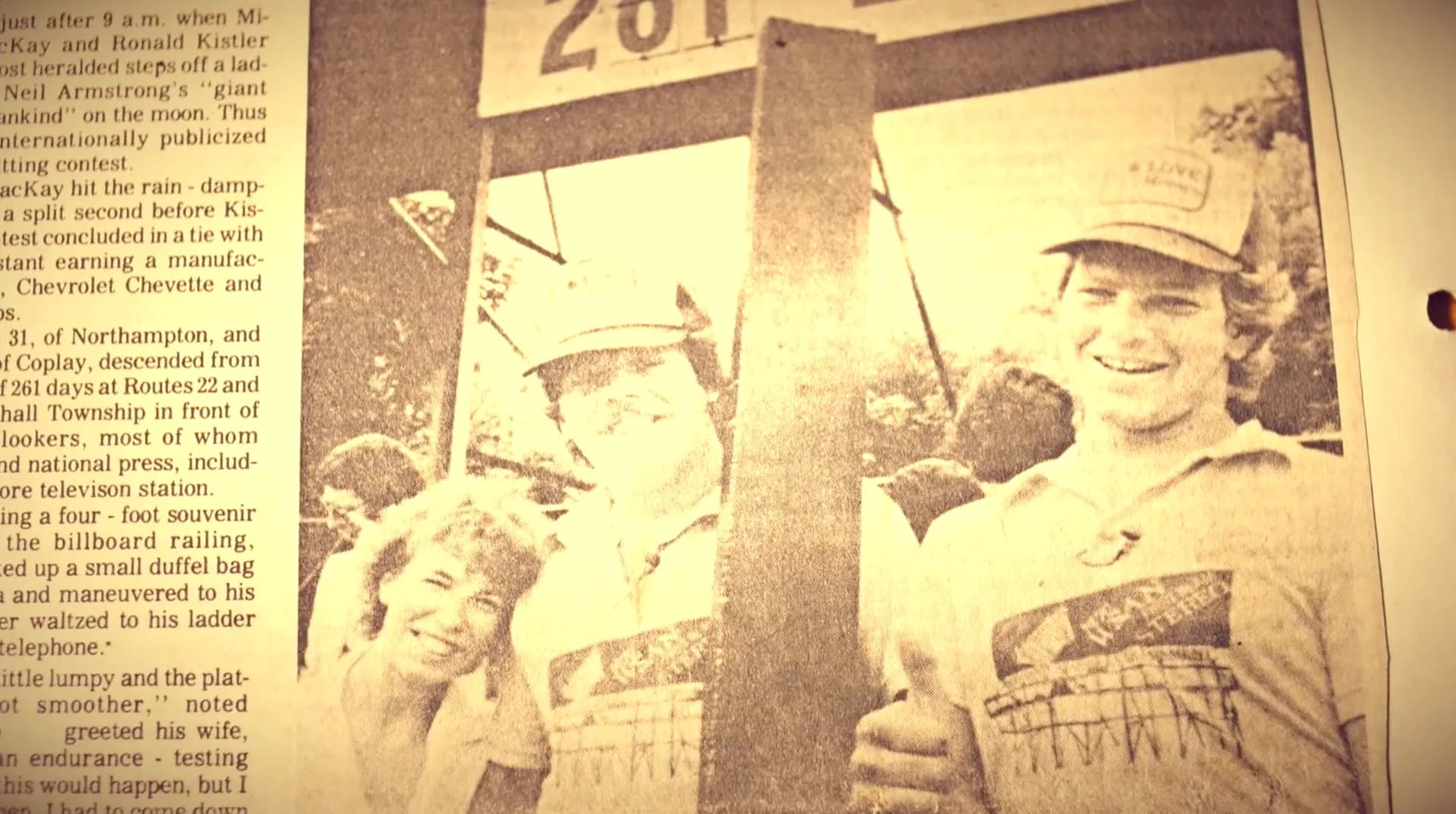 Newspaper photo of the last two contestants celebrating